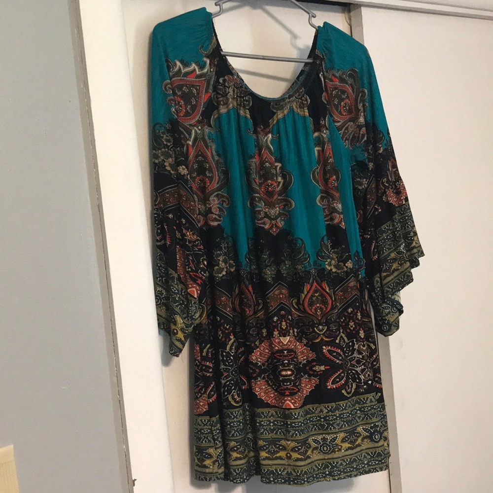 Loose fitting top with bell sleeves